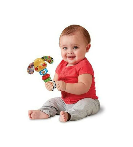 Vtech Puppy Toby rattle toy for babies, colorful with hanging teething rings, designed for young children’s sensory development.