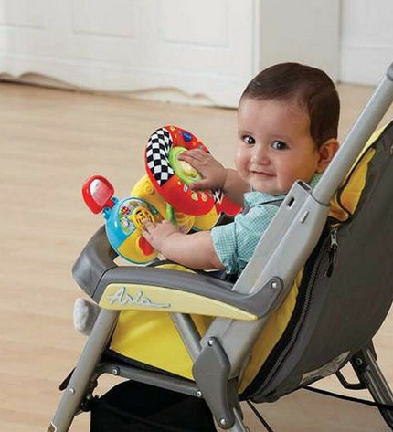 Vtech baby stroller handle toy, 30 x 11.6 x 24 cm, designed for young children, featuring colorful buttons and playful details.