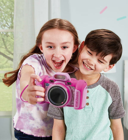 Pink Vtech Kidizoom Duo DX toy camera with colorful buttons and a screen for kids to explore digital photography and entertainment.