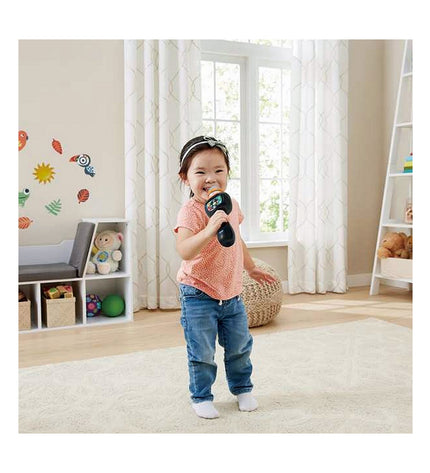 Vtech Sing with Me! karaoke microphone toy for kids, electronic toy with colorful design and singing features.