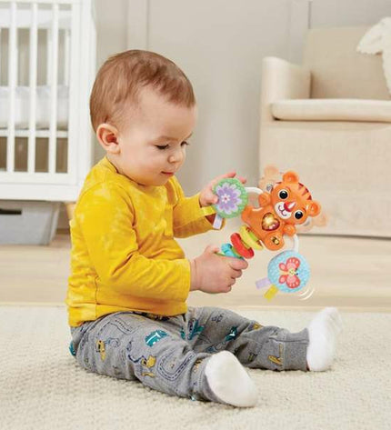 Vtech baby rattle in tiger design, soft plush toy for young children, 18.4 x 16 x 4.7 cm, colorful and easy to grip.