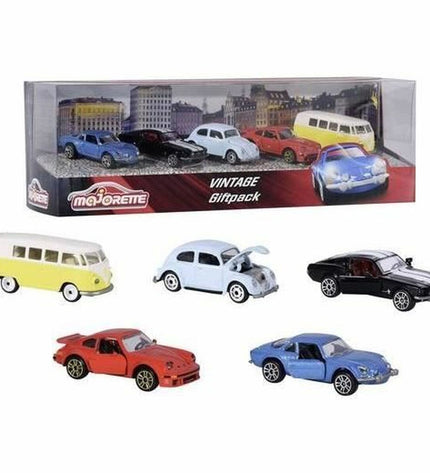 Smoby Vintage vehicle playset with five toy vehicle pieces, colorful plastic construction, designed for children's imaginative play.