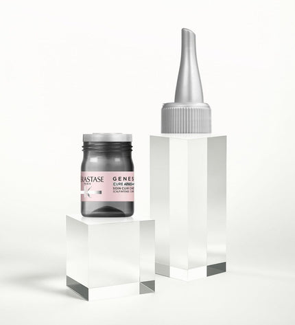 Kerastase GENESIS 6 ml voedingssupplement bottle for hair health, vitamin and mineral supplement in a small, sleek container.