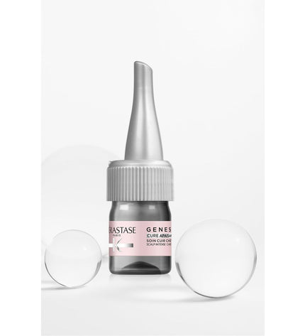 Kerastase GENESIS 6 ml nutritional supplement bottle for health and personal care, with product label visible.
