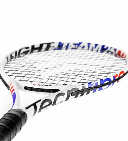 Tecnifibre TFIGHT 25 Team Infantil tennis racket for kids, outdoor sport, with black and white design and grip handle.
