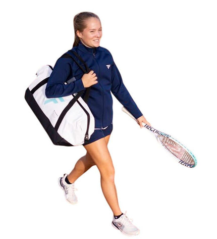 Tecnifibre Tour Endurance tennis racket with black and white design, featuring a grip and strings, suitable for outdoor tennis play.