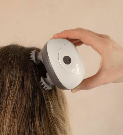 Livoo DOS202 rechargeable handheld massager with removable head for health and personal care, designed for soothing relaxation.