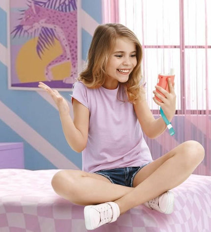 Canal Toys walkie-talkie toy with colorful design, electronic toy for kids, featuring buttons and speaker grille.