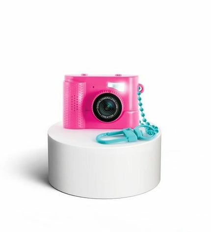Canal Toys digital camera for kids, electronic toy with colorful buttons and compact design, suitable for young children.