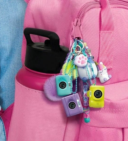 Canal Toys digital camera for kids, colorful electronic toy with buttons and screen, designed for playful photography adventures.