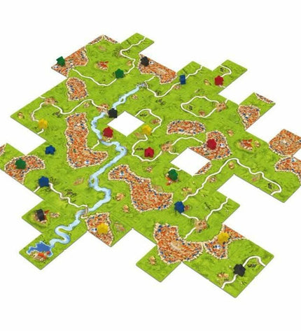 Asmodee Carcassonne board game with colorful tiles and game pieces spread out, ready for play.