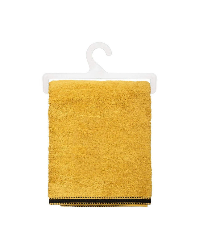Soft mustard yellow 5five Simply Smart bath towel made of 100% cotton, measuring 150 x 100 cm, ideal for home and bathroom use.