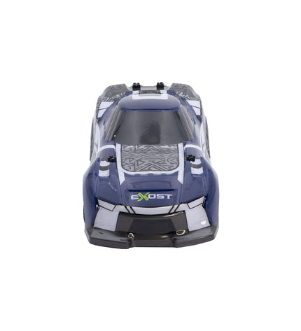 Remote control police car toy by Exost, detailed blue and white police vehicle with flashing lights and realistic design.
