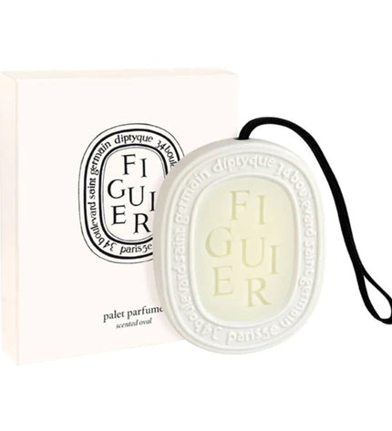 Diptyque Scented Oval air freshener, 35g, elegant home decor item for freshening indoor spaces.