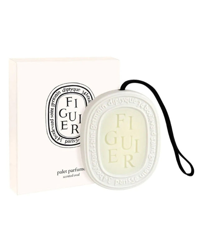 Diptyque Scented Oval air freshener, 35g, elegant home decor item for freshening indoor spaces.