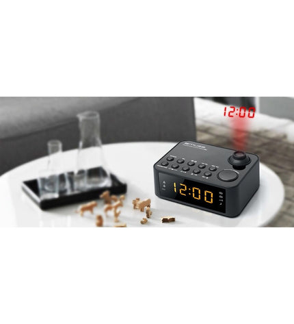 Muse M-178P radio alarm clock with digital display, showing buttons and sleek black design, part of electronic audio equipment.
