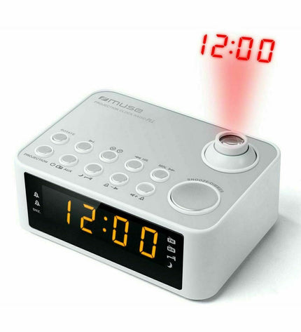 Muse M-178PW radio alarm clock with digital display, black plastic casing, and control buttons on top.