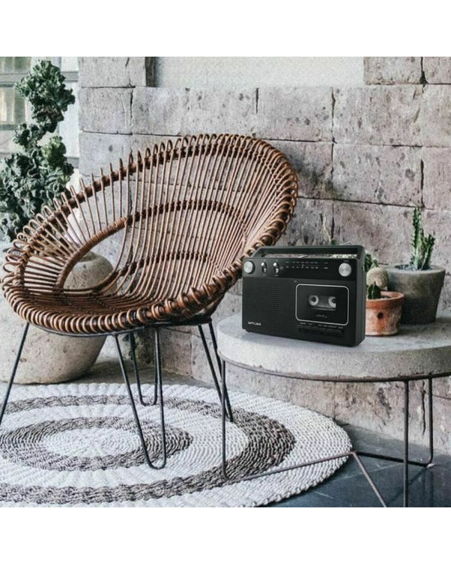 Black Muse M-152 RC portable radio with cassette player, vintage electronic audio device for music and radio listening.