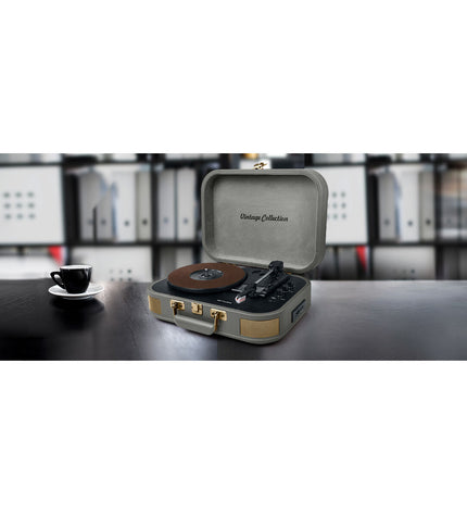 Green Muse MT201BTG turntable with tonearm and control buttons, part of electronic audio and hi-fi equipment.