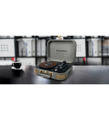 Muse MT201BTG green turntable with built-in speakers and Bluetooth connectivity, featuring a sleek vintage design for audiophile enjoyment.
