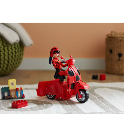 Miraculous: Tales of Ladybug & Cat Noir action figure riding a motorcycle, colorful toy from the popular superhero series.
