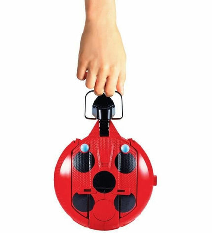 Miraculous: Tales of Ladybug & Cat Noir action figure on a motorcycle toy for kids, detailed superhero playset.
