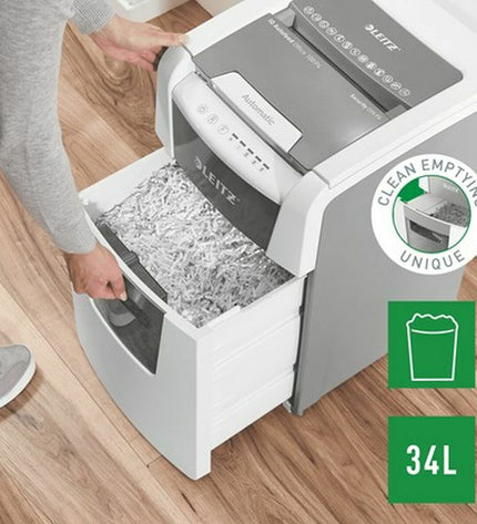 Leitz IQ 100 Autofeed paper shredder for office use, showing the sleek black design and paper feed slot.