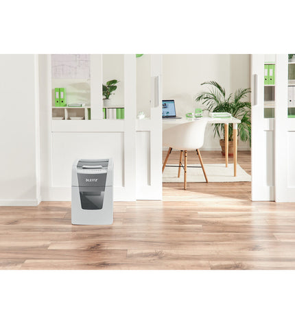 Leitz IQ 100 Autofeed paper shredder with microsnippers for office use, black and compact design.