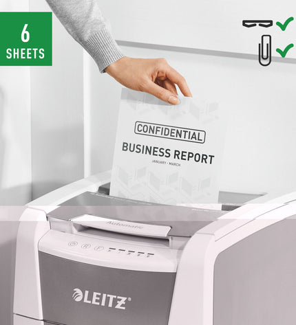 Leitz IQ 100 Autofeed paper shredder for office use, compact design, with paper feed tray and electronic controls.