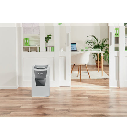 Leitz IQ 150 Autofeed paper shredder for office use, with paper feed opening and control panel, in a professional office setting