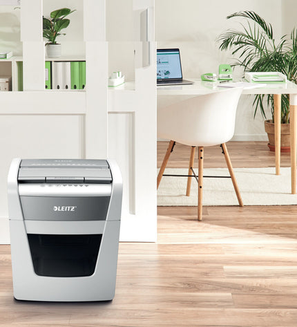 Leitz IQ Autofeed 50X P4 paper shredder for office use, with 20-liter waste bin and electronic controls.