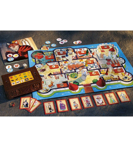Ravensburger "Who Saw It?" game box with colorful illustrations and game components for children and family fun.