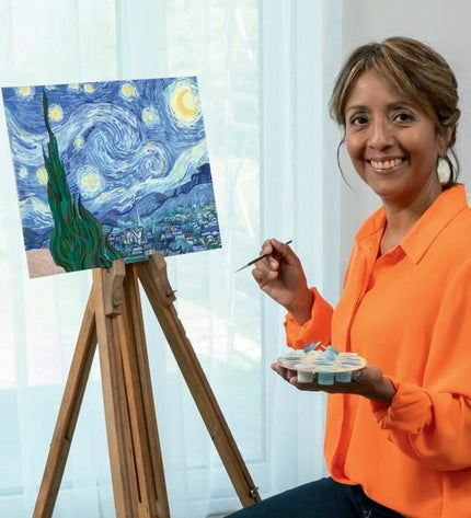 Ravensburger CREART Van Gogh puzzle game with colorful artwork and game pieces, ideal for family fun and artistic creativity.