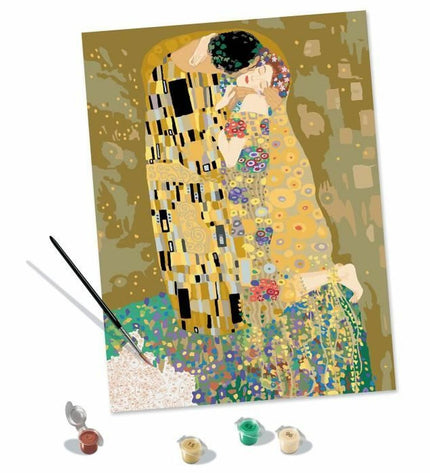 Ravensburger CREART The Kiss game featuring colorful artwork, playful design, and game pieces on a white background.