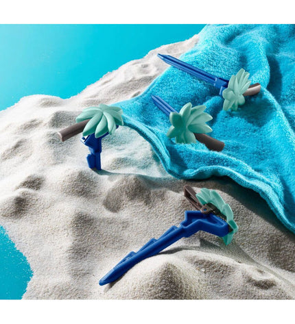 Set of four Lifetime plastic palm tree hand towel clips for bathroom and kitchen use, durable plastic construction.