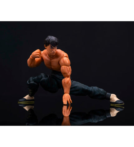 Smoby Ledenpop 15 cm action figure from speelgoed en games collection, featuring detailed design and colorful clothing.