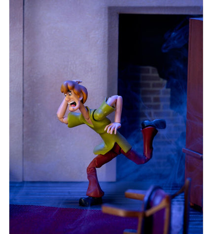 Scooby-Doo Shaggy Rogers action figure, 15 cm tall, from Scooby-Doo toy and game collection, featuring Shaggy in casual outfit.
