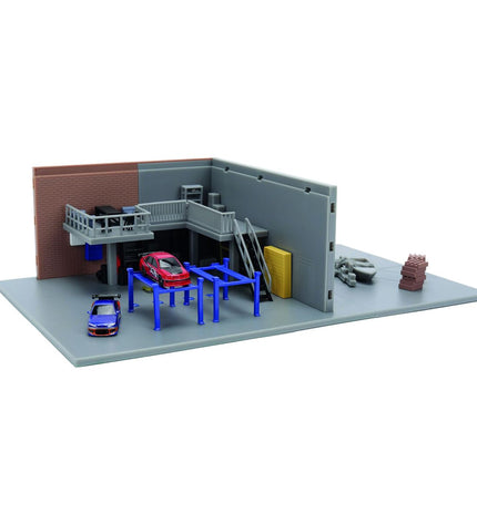 Smoby parking lot toy set with colorful plastic parking spaces and miniature vehicles, designed for children's play and imagination.