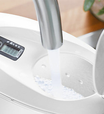Brita Marella Cool water jug with filter, 2.4 liters, placed on a kitchen countertop for clean, filtered drinking water.