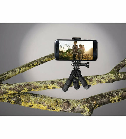 Hama draagbaar statief for electronics and cameras, compact and lightweight, with adjustable legs and mounted camera.
