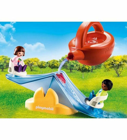 Playmobil Water Rocker playset with sprinkler, includes 7-piece toy set featuring colorful water-themed figures and accessories.