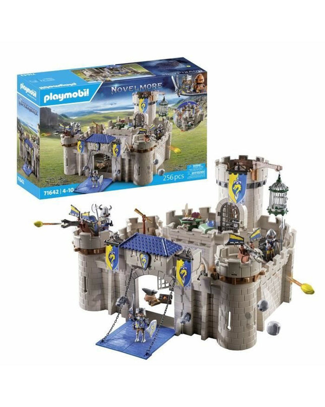 Playmobil playset with colorful figures and accessories, featuring detailed characters and toy structures for imaginative play.