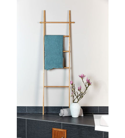 Wenko Bahari bamboo towel rack for bathroom and kitchen, with multiple bars for hanging towels and a natural bamboo finish