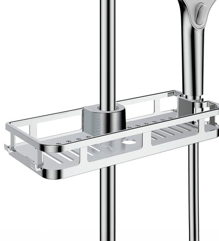 Wenko Libertà chrome ABS bathroom shelf, 28.5 x 4 x 11.5 cm, mounted on bathroom wall with toiletries.