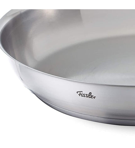 Fissler stainless steel pan with 24 cm diameter, shiny silver finish, suitable for home cooking and kitchen use.
