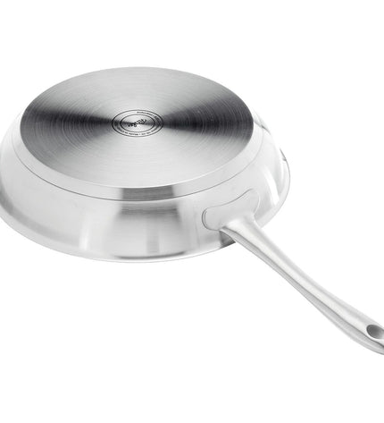 Fissler stainless steel pan with silver metallic finish, suitable for cooking and kitchen use.