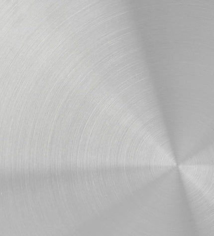 Fissler stainless steel pan with silver metal finish, ideal for home cooking and kitchen use.