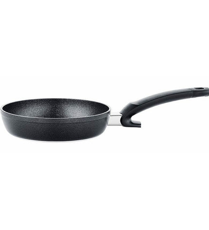 Fissler 15910520100/0 black aluminium 20cm frying pan for household cooking, with a black handle and non-stick interior.