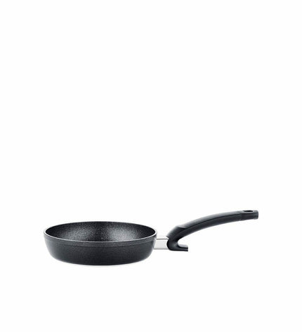 Black Fissler aluminum pan with 20 cm diameter for home cooking, shown from top view with handle and cooking surface.