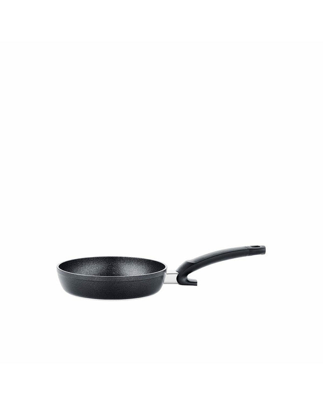 Black Fissler aluminum pan with 20 cm diameter for home cooking, shown from top view with handle and cooking surface.